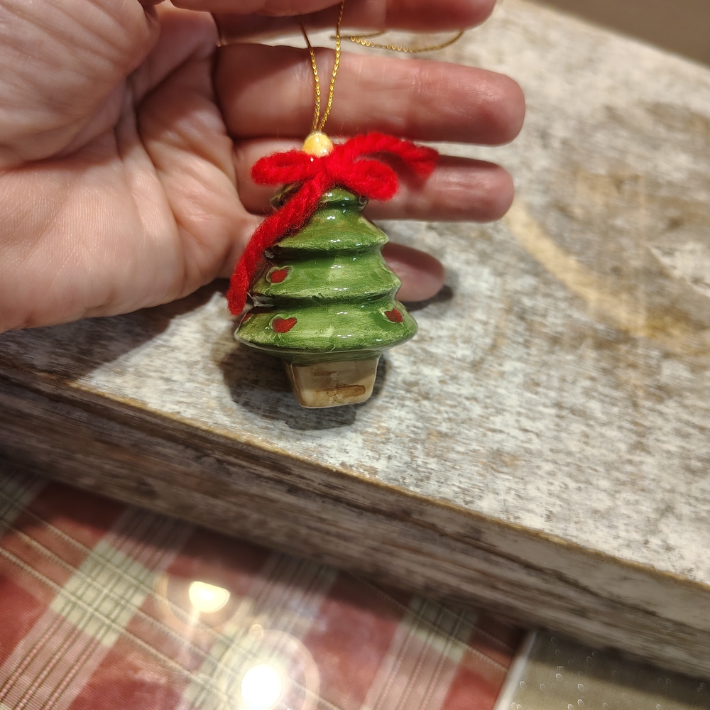 Festive Green Christmas Tree Ornament with Red Accents